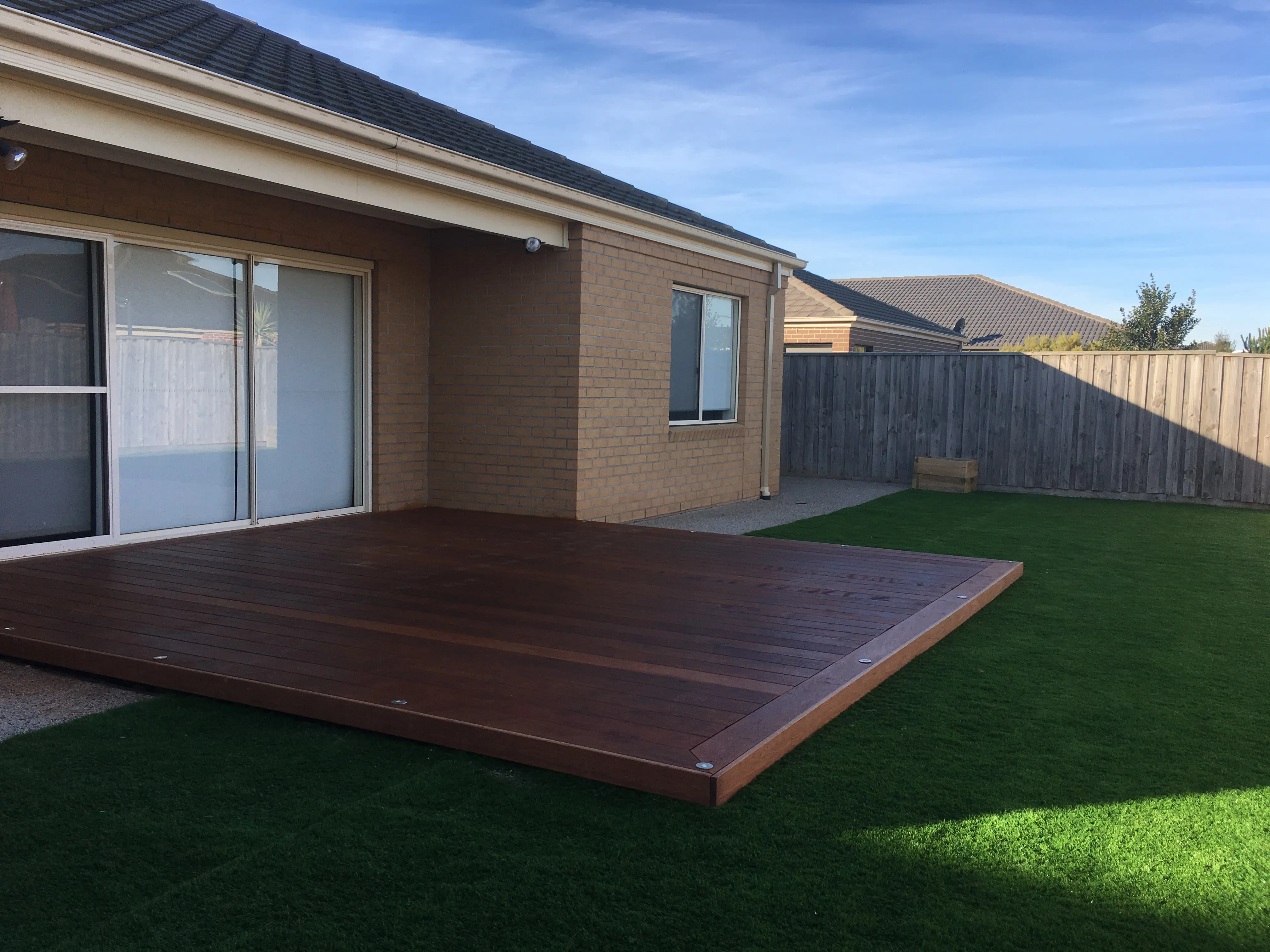 Classic Australian Backyard: Modern Deck & All-Weather Lawn
